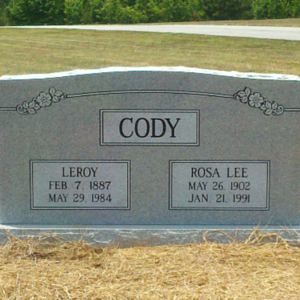 Gray upright memorial with the name Cody. 