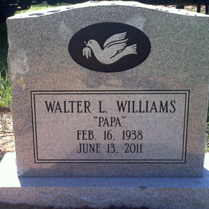 Gray single upright memorial with a dove engraving and the name Walter L. Williams 